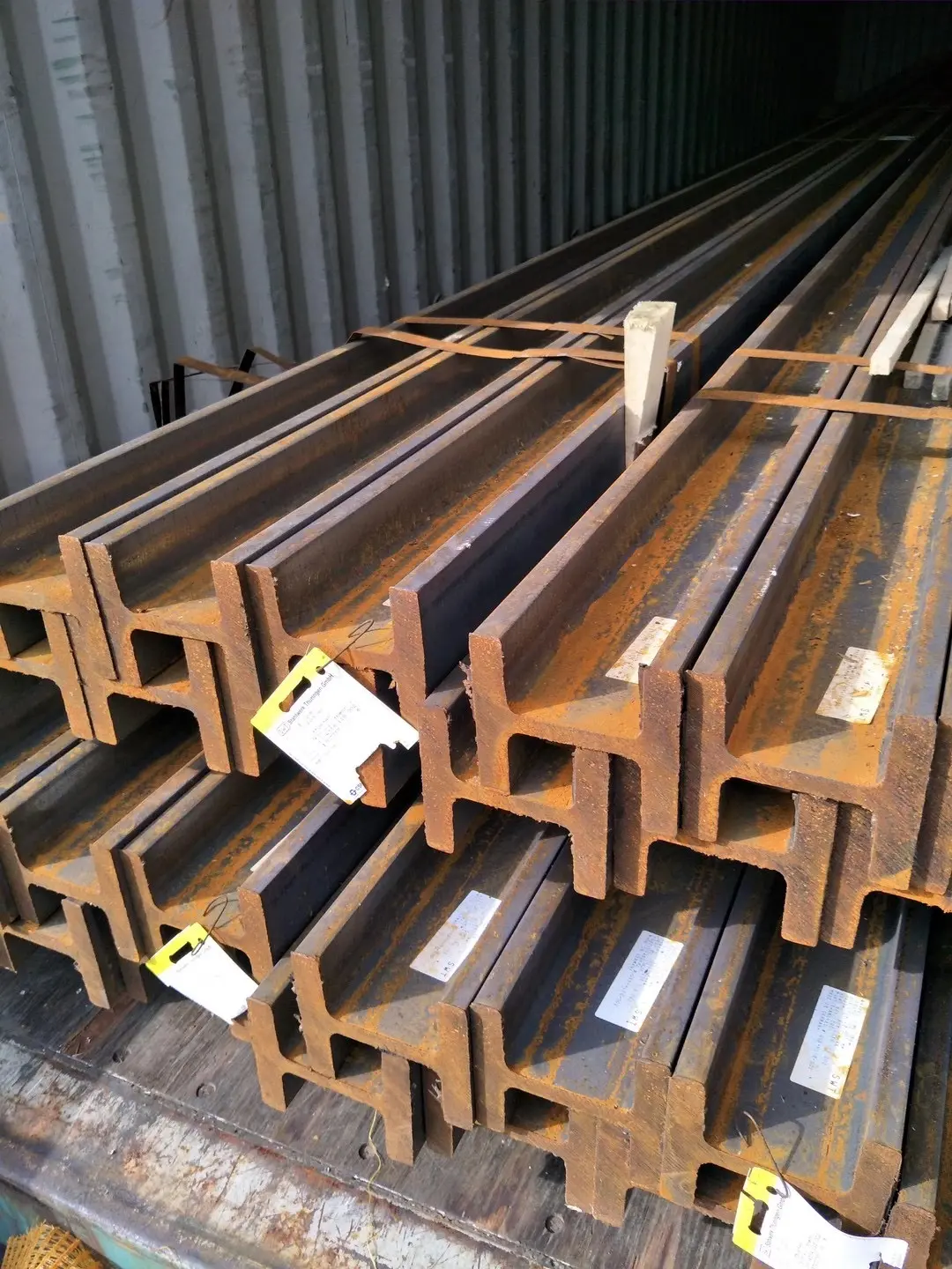 Round steel pipes stacked in the yard ready for bulk dispatch
