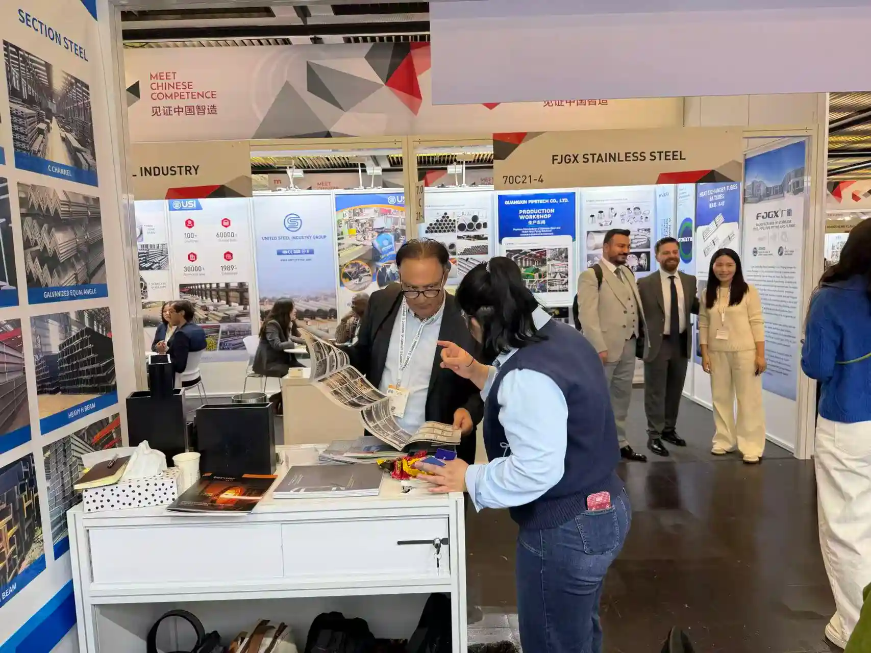 Xin Jiyuan team at an international steel trade exhibition
